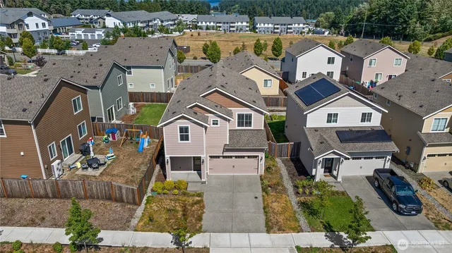an aerial view of a house with a garden