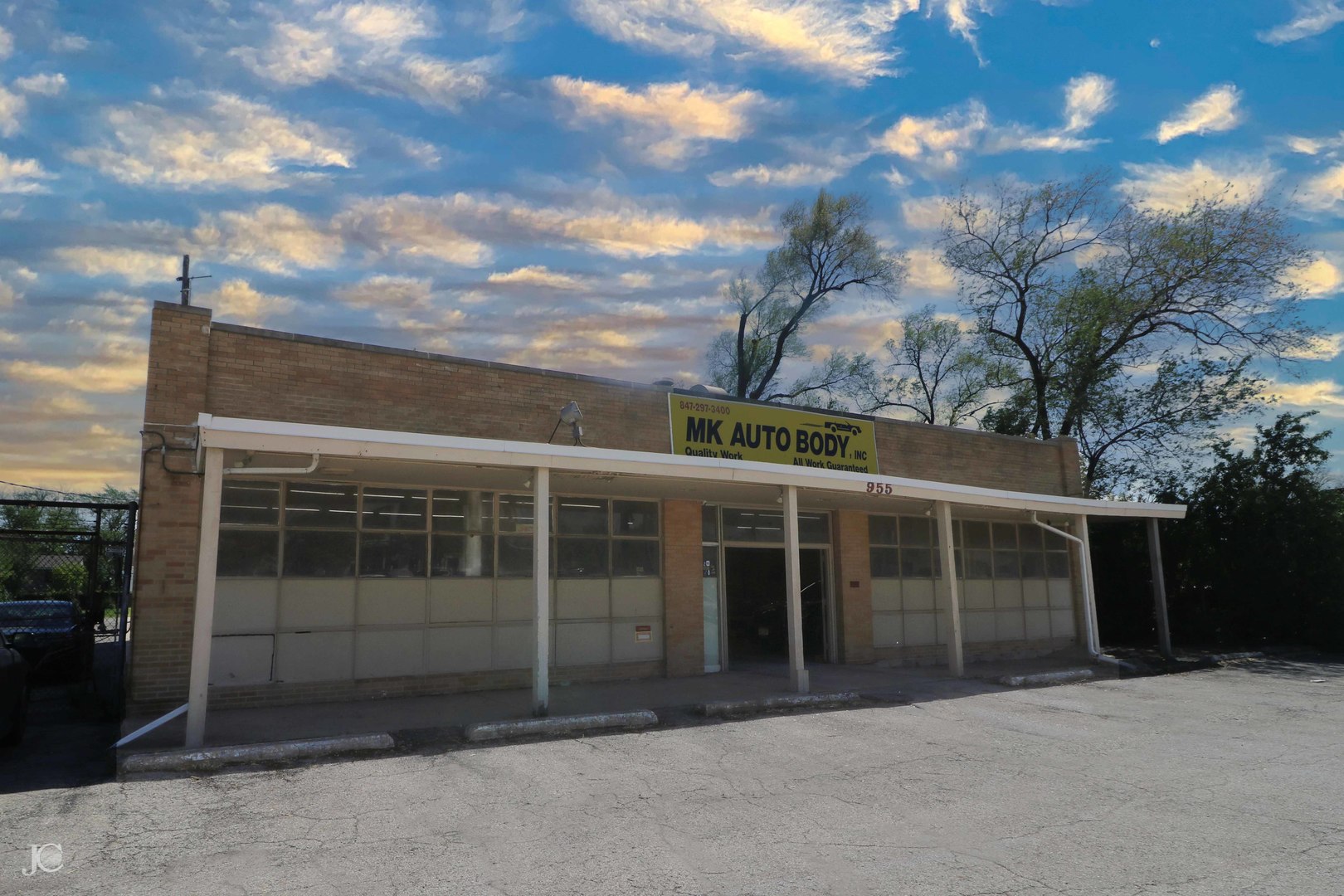 955 Rand Road Des Plaines, IL 60016 - Photo 2 of 12 a view of a house with a large window and a tree