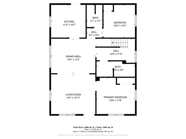 a picture of a bench in front of a wall