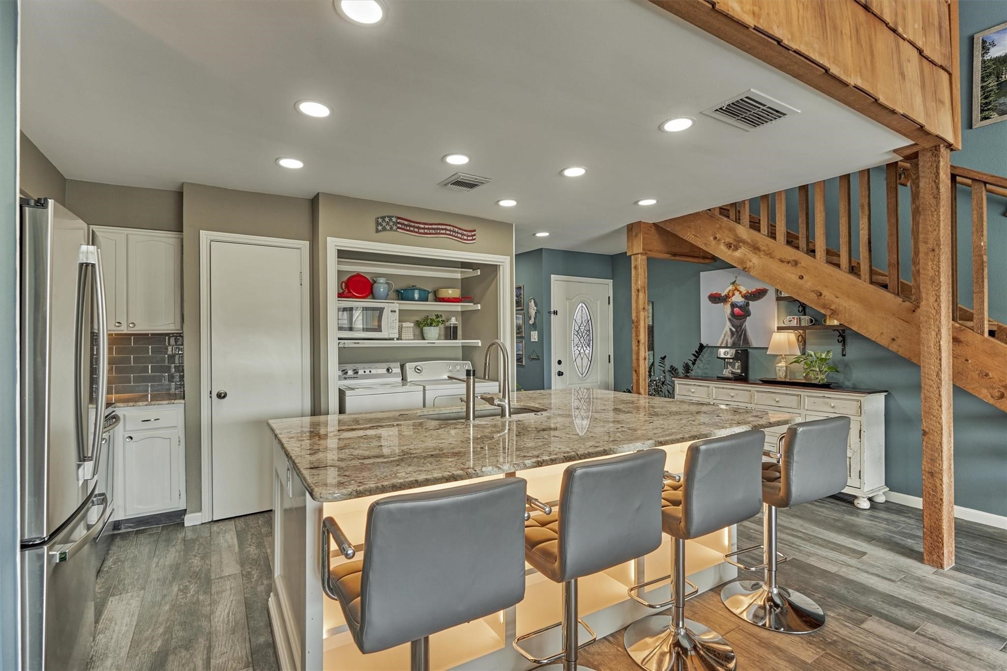 1 April Point Drive South Montgomery, TX 77356 - Photo 13 of 45 An abundance of recessed lighting was added to brighten and modernize the space.