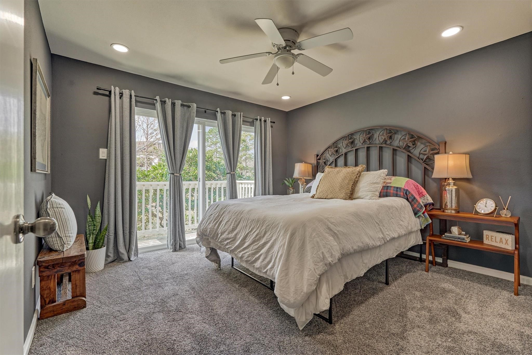 1 April Point Drive South Montgomery, TX 77356 - Photo 29 of 45 A second bedroom upstairs also has a sliding glass door to its own balcony. Recessed lighting, new carpet and fresh paint were added to this space.