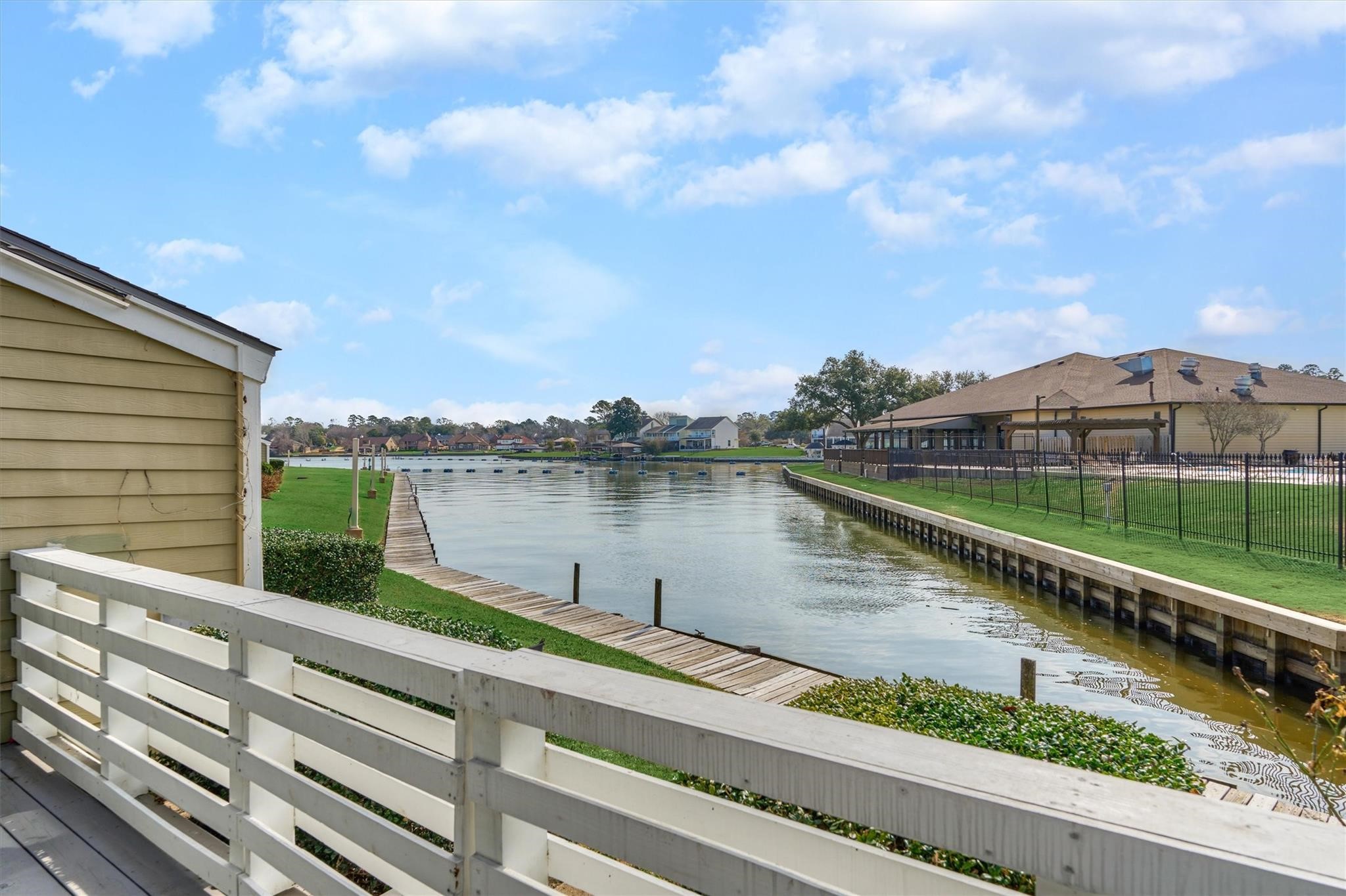 1 April Point Drive South Montgomery, TX 77356 - Photo 39 of 45 The townhome is angled in such a way to enjoy maximum views of the lake. Let this be your spot to unwind at the end of a long day!