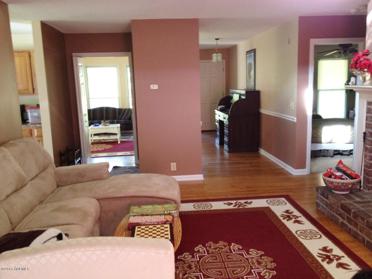 229 Johnson Landing Road Beaufort, SC 29907 - Photo 6 of 38 229 JL-LVRM & view to other rooms