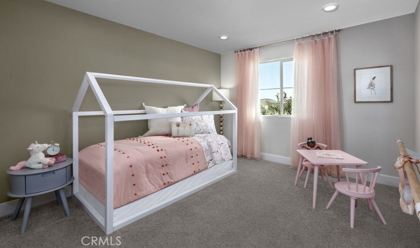 33377 Rusty Court French Valley, CA 92596 - Photo 9 of 23 a bedroom with a bed a table and chair