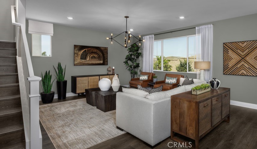 33377 Rusty Court French Valley, CA 92596 - Photo 13 of 23 a living room with furniture a window and a chandelier