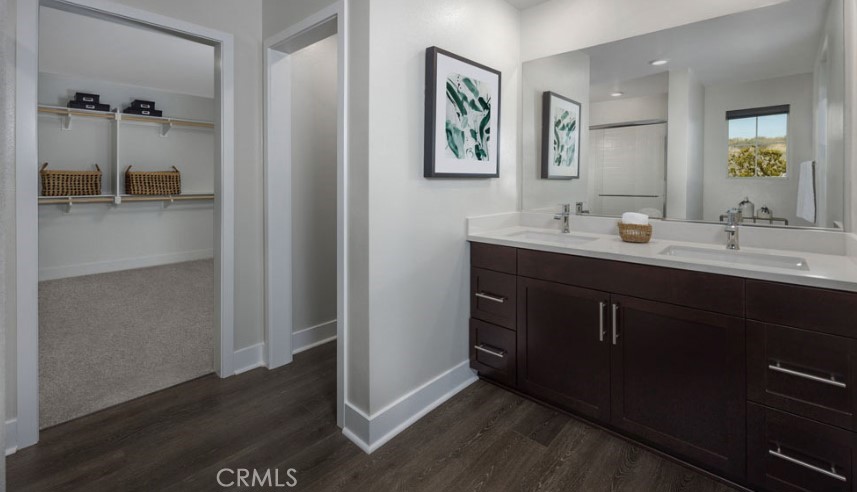 33377 Rusty Court French Valley, CA 92596 - Photo 4 of 23 a bathroom with a sink and mirror