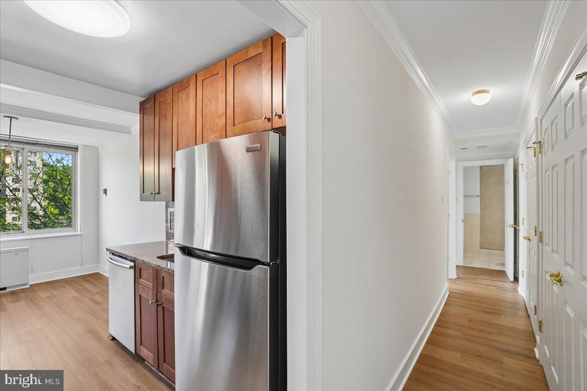 4000 Tunlaw Road Northwest, Unit 1003 Washington, DC 20007 - Photo 11 of 25 Modern kitchen with natural light.