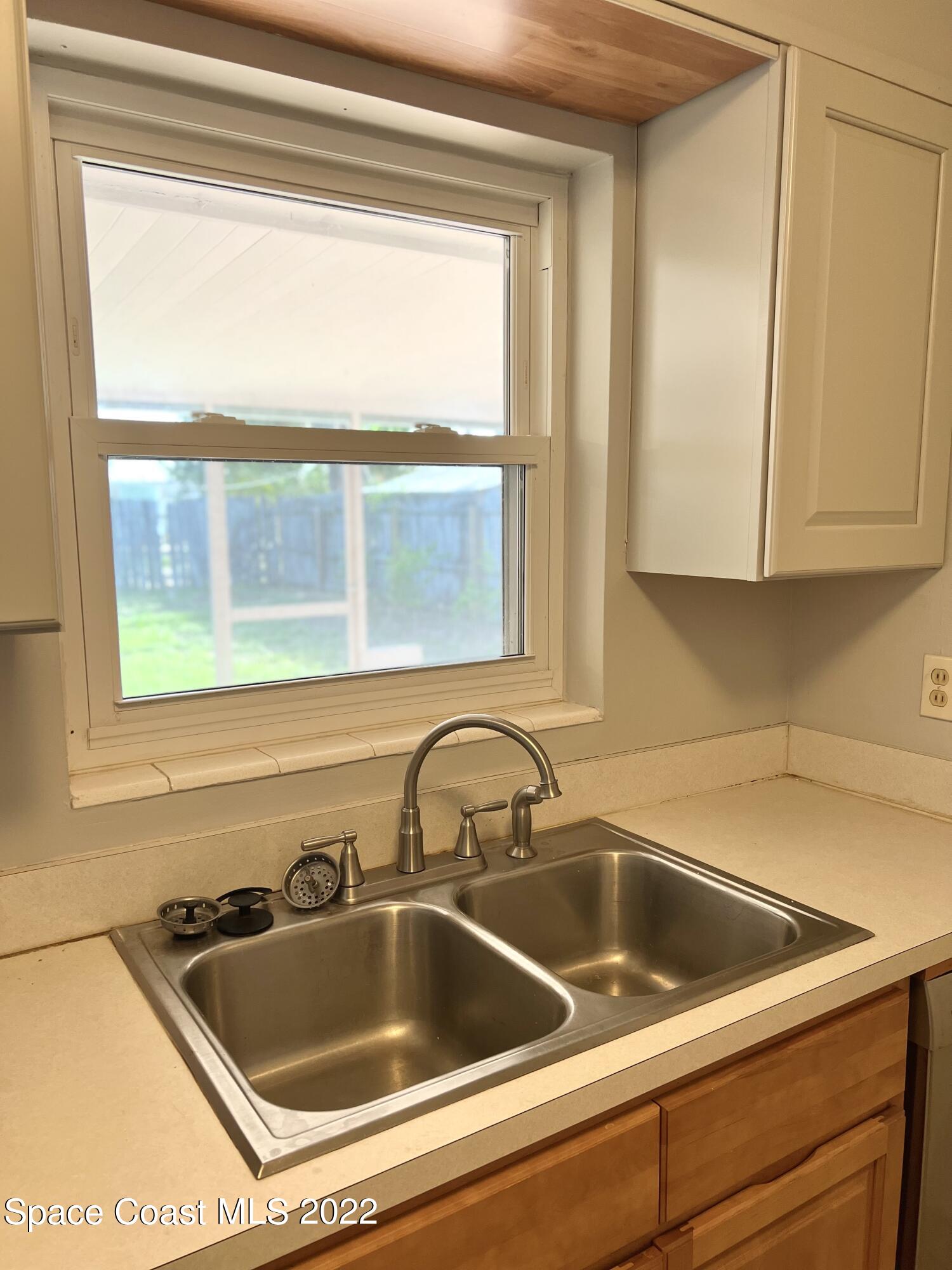 282 Fay Drive Indialantic, FL 32903 - Photo 15 of 27 a close view of sink and tap