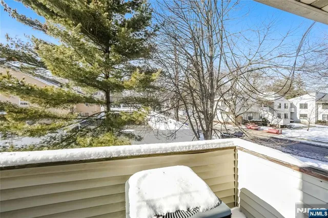 a view of a lake from a balcony
