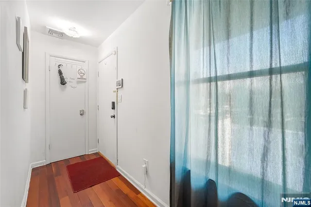 a view of a bedroom from the hallway