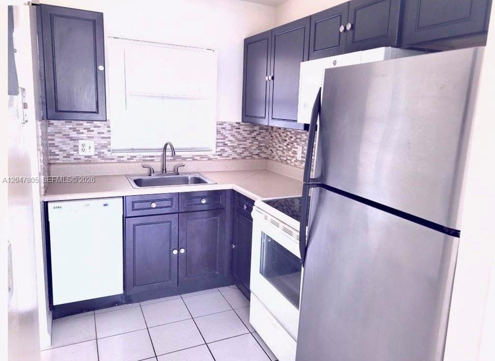 9851 Sandalfoot Boulevard, Unit 213 Boca Raton, FL 33428 - Photo 2 of 10
