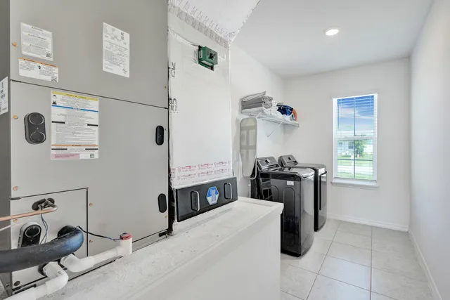 a kitchen with a stove and a refrigerator
