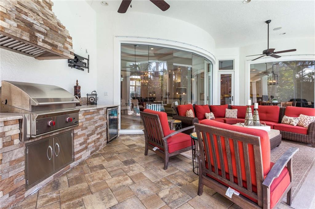 516 Portside Drive Naples, FL 34103 - Photo 30 of 33 a living room with furniture
