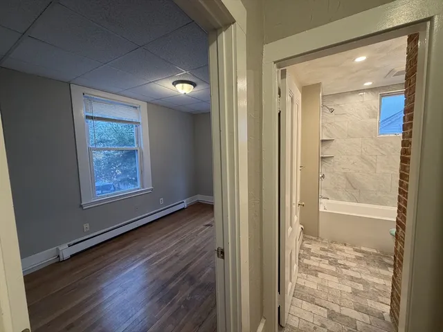 a view of an empty room and window