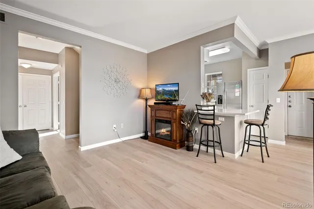 a view of a livingroom with furniture and wooden floor