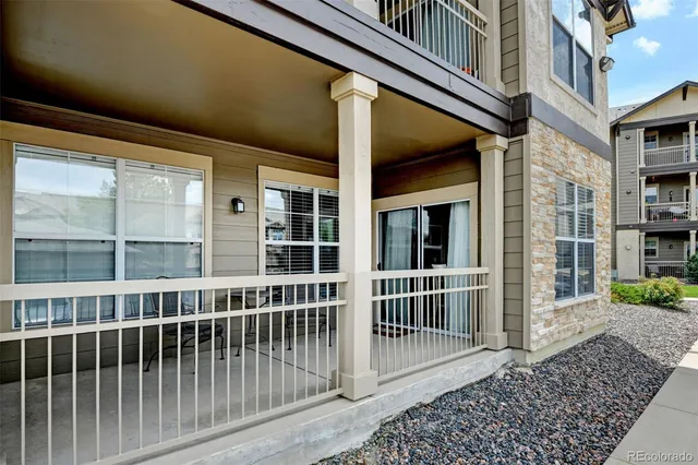 a view of a porch with furniture