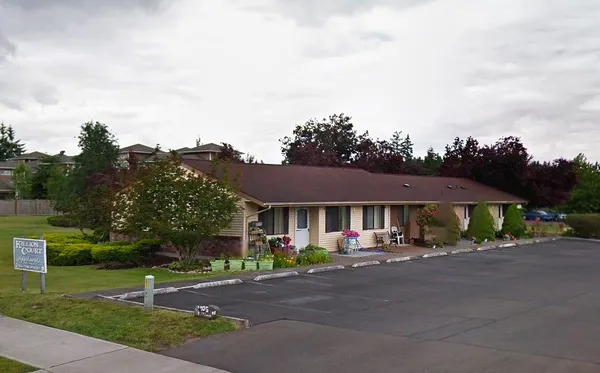 a row of houses with outdoor space and view of street
