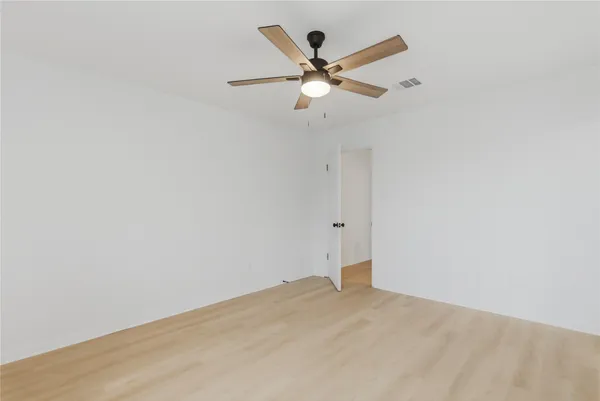 a view of a big room with wooden floor