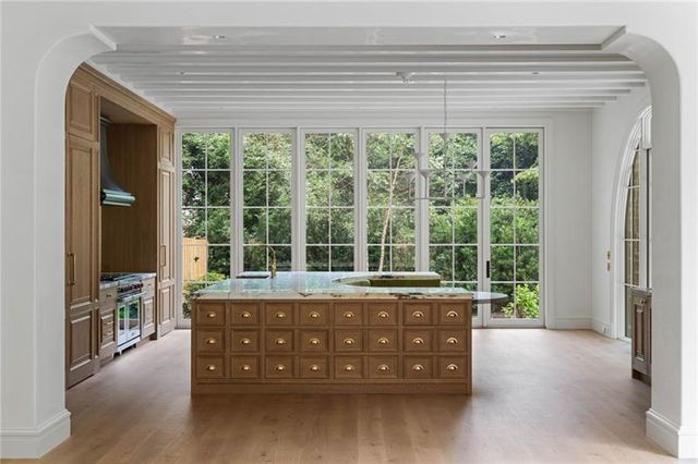 a view of a room with white walls