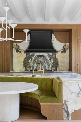 a white bath tub sitting next to a window