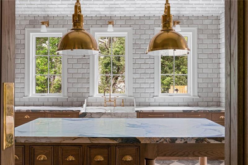 41 Blackland Road Northwest Atlanta, GA 30342 - Photo 22 of 106 a kitchen with a sink and a window