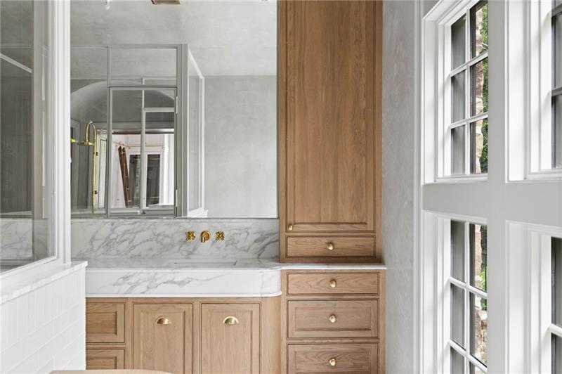 41 Blackland Road Northwest Atlanta, GA 30342 - Photo 28 of 106 a bathroom with a granite countertop sink and a mirror