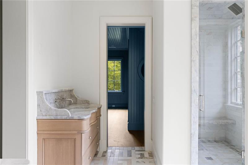 41 Blackland Road Northwest Atlanta, GA 30342 - Photo 46 of 106 a bathroom with a granite countertop sink and a mirror