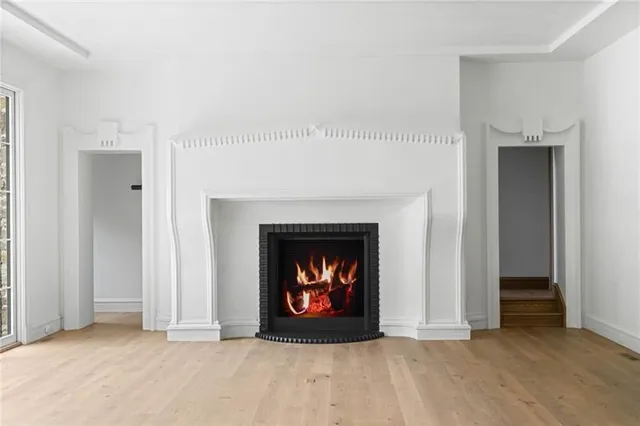 a view of a garden with an outdoor seating space
