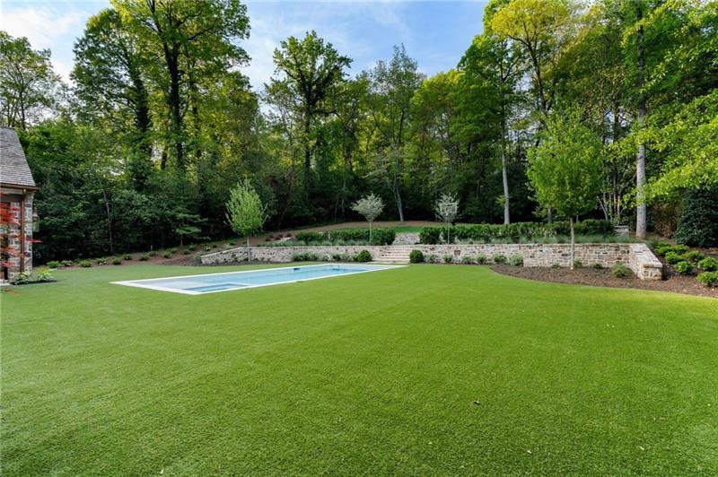 41 Blackland Road Northwest Atlanta, GA 30342 - Photo 90 of 106 a view of outdoor space with green field and trees