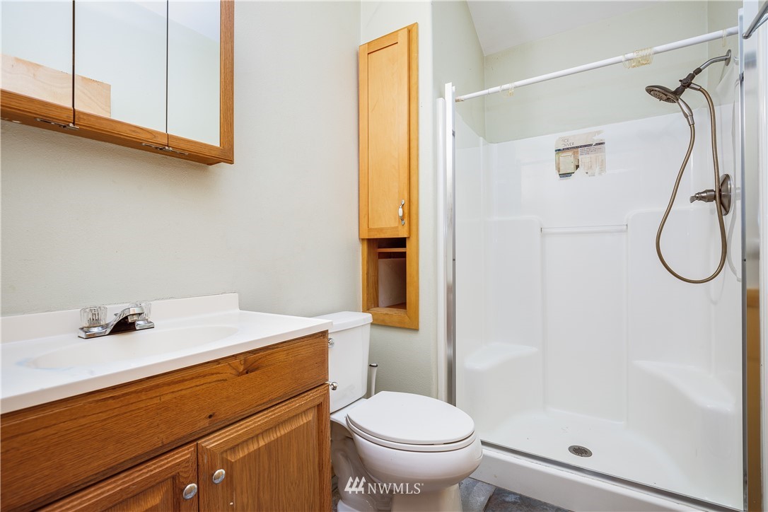 17510 Southeast 121st Place Renton, WA 98059 - Photo 33 of 40 a bathroom with a sink a toilet and shower