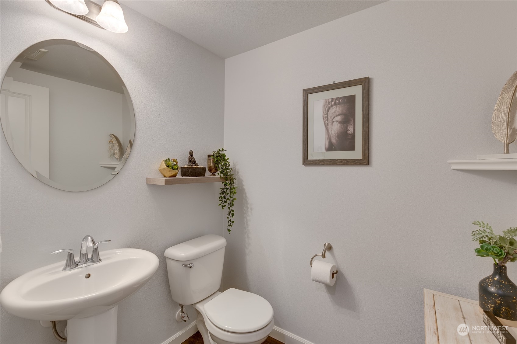 15932 Meridian Avenue South Bothell, WA 98012 - Photo 4 of 33 a bathroom with a toilet a sink and mirror