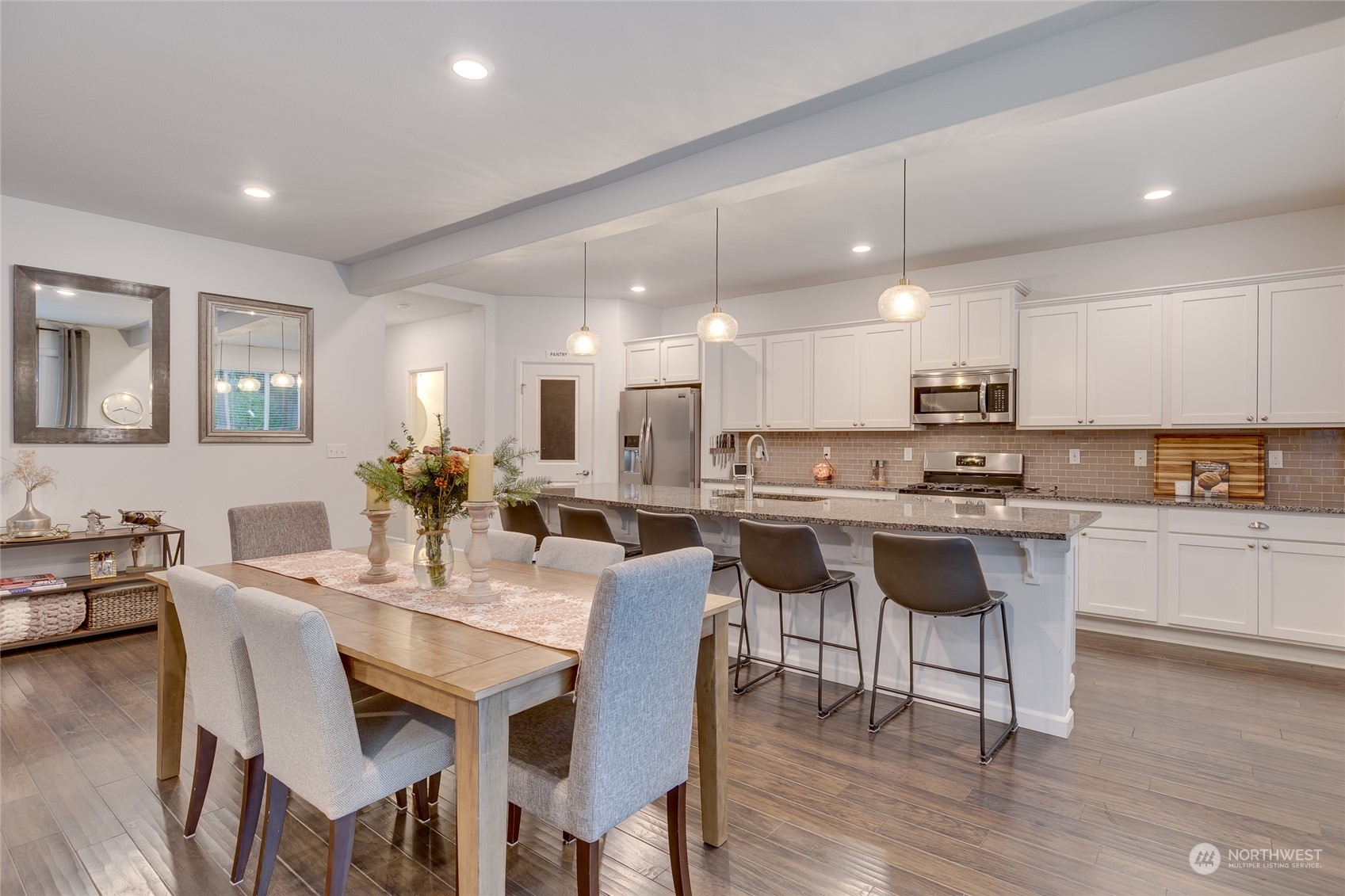 15932 Meridian Avenue South Bothell, WA 98012 - Photo 5 of 33 a large kitchen with a table and chairs