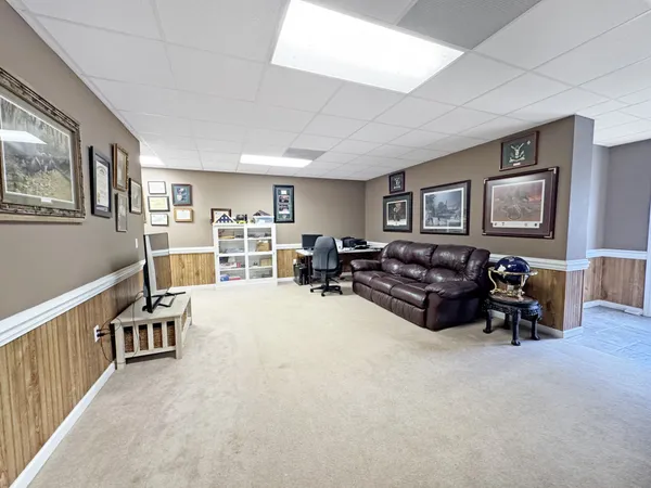 a living room with furniture and a couch