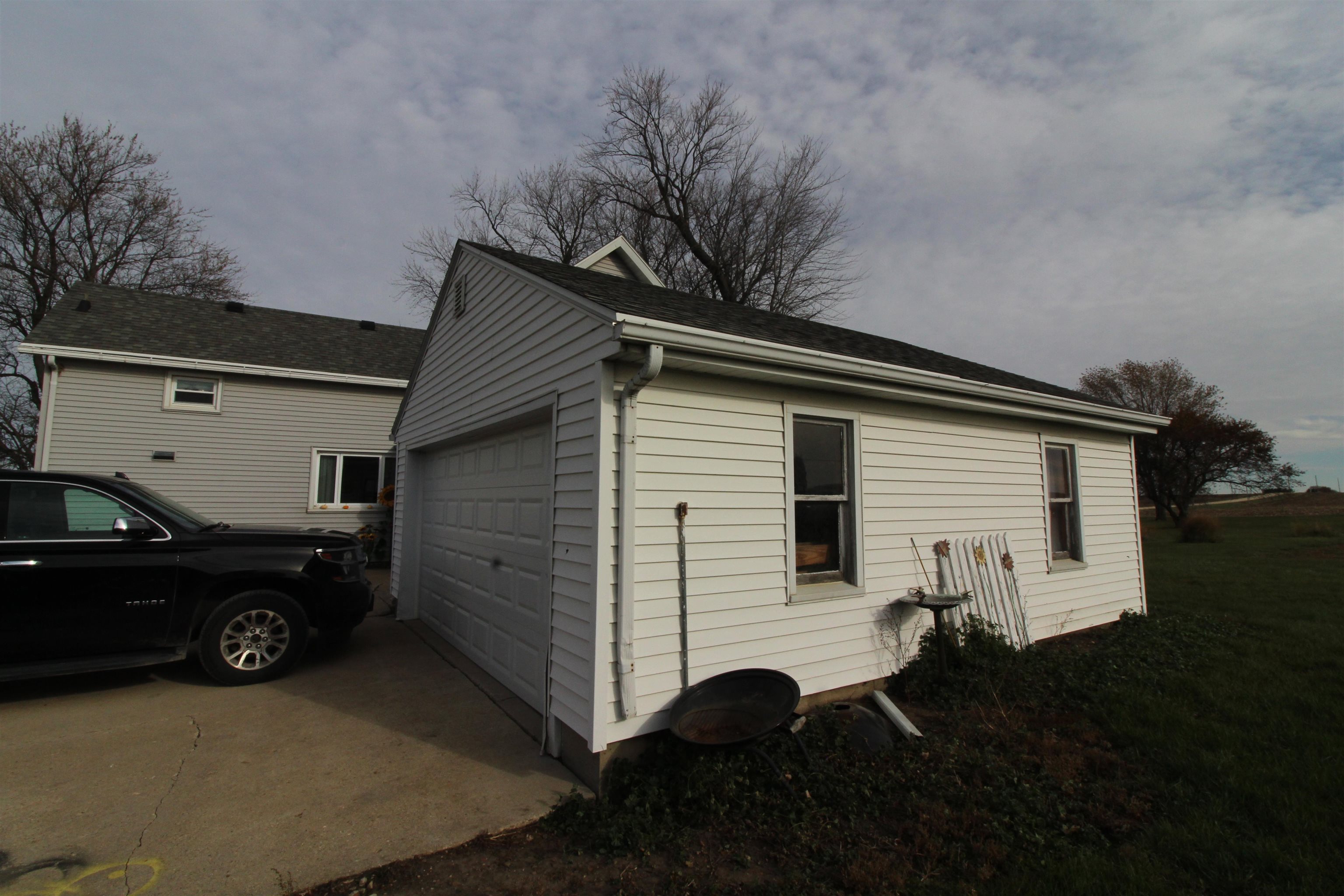 3543 West Prairie Road Freeport, IL 61032 - Photo 3 of 28 a view of a car in front of a house