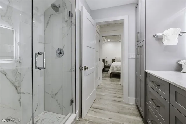 a view of a bathroom from a hallway