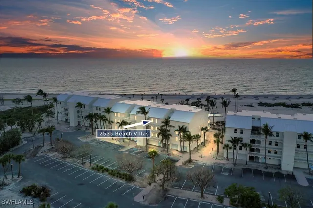 an aerial view of a building with outdoor space