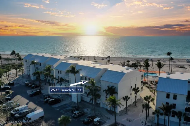 a view of a city with an ocean view