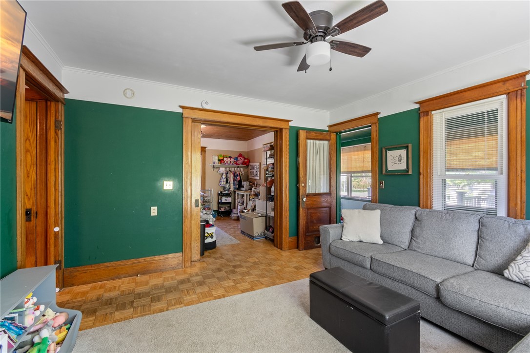 5443 Russell Road Marion, NY 14505 - Photo 20 of 48 The living room to the sellers workspace- just clo