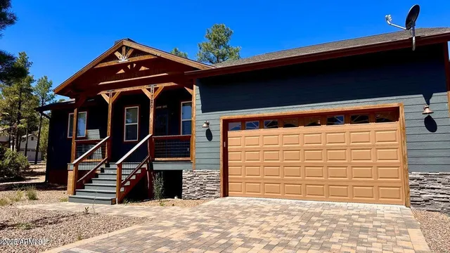 a front view of a house with a garage