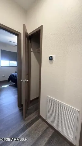a view of livingroom with furniture and wooden floor