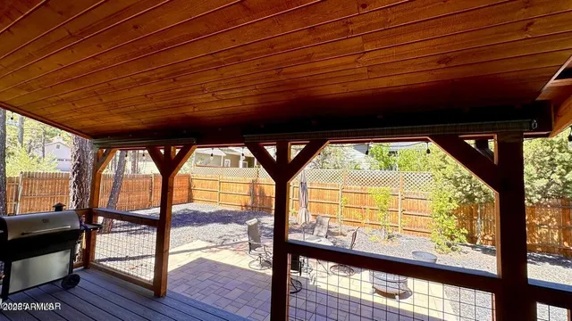 a view of a large trees with an outdoor space