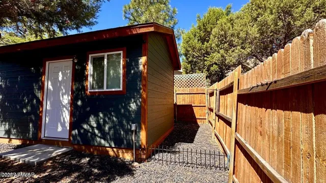 a view of a house with a large window