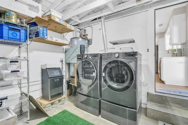 a utility room with dryer and washer