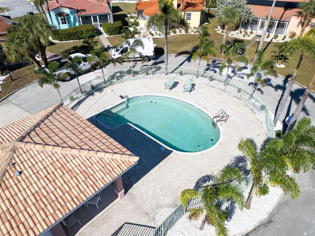 16613 Gulf Boulevard North Redington Beach, FL 33708 - Photo 41 of 51 an aerial view of a swimming pool with outdoor seating