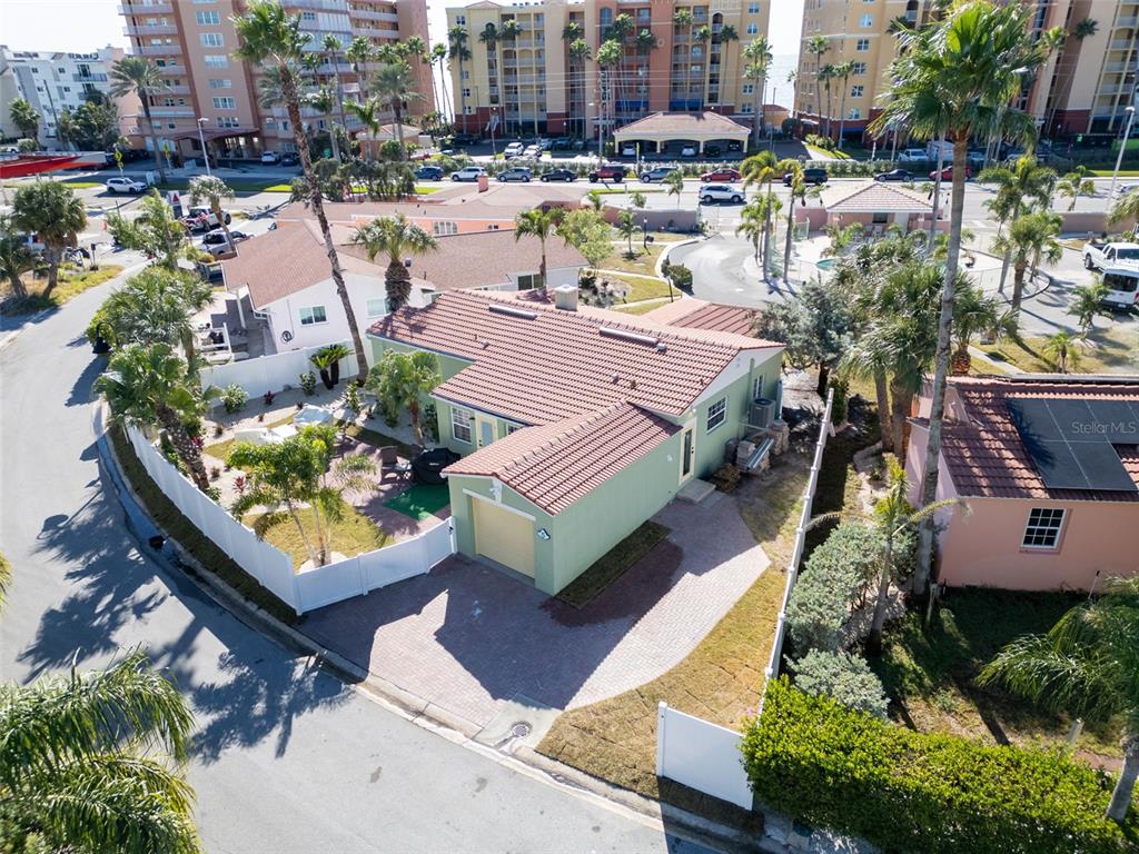 16613 Gulf Boulevard North Redington Beach, FL 33708 - Photo 48 of 51 a view of a swimming pool with lounge chairs