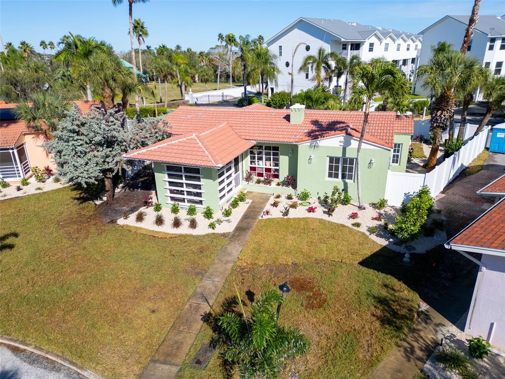 16613 Gulf Boulevard North Redington Beach, FL 33708 - Photo 50 of 51 an aerial view of multiple houses with yard