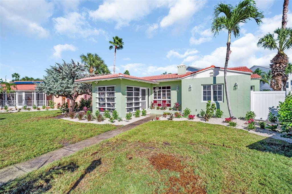 16613 Gulf Boulevard North Redington Beach, FL 33708 - Photo 51 of 51 a front view of a house with garden