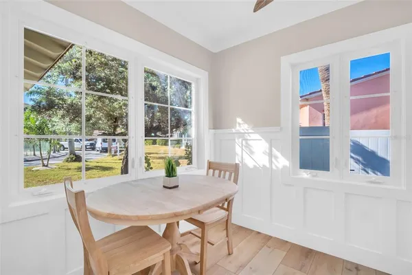 a view of a dining room with furniture window and outside view