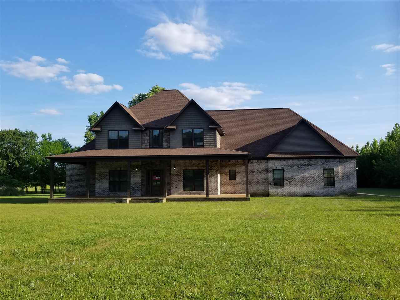 2 Cr 518b Road Rienzi, MS 38865 - Photo 1 of 24 a front view of house with yard and porch