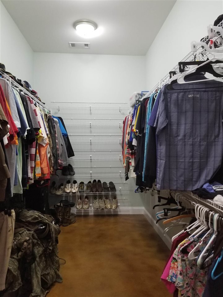2 Cr 518b Road Rienzi, MS 38865 - Photo 11 of 24 a view of walk in closet with clothes and shoes